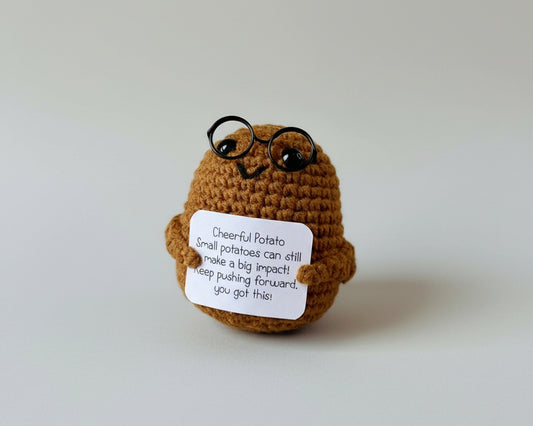 Cheerful Potato mit Brille und positiver Botschaft mit einer klarer Hintergrund